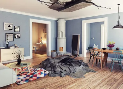 Flooded kitchen with a floating chair, no one in the room.